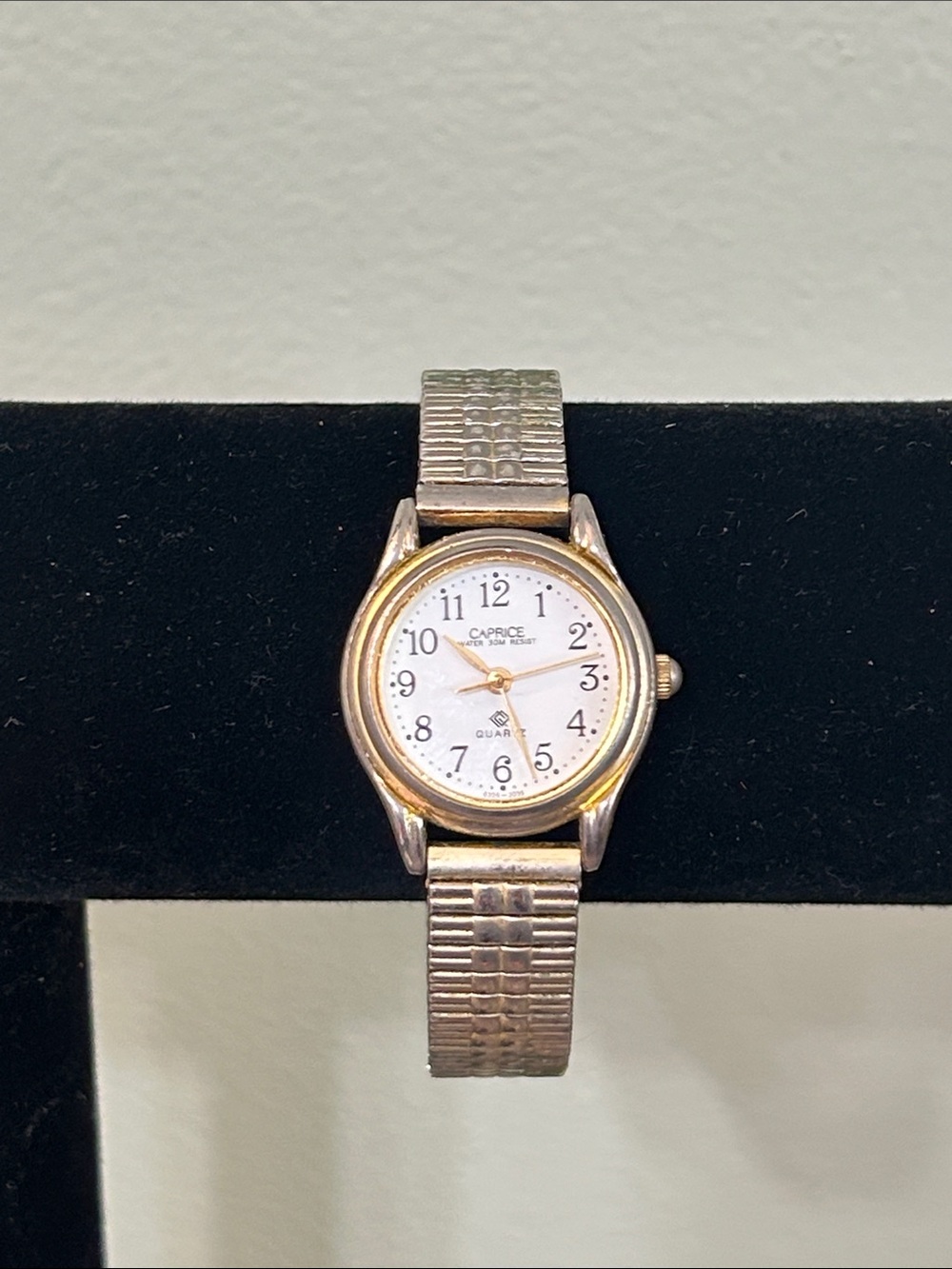 Caprice Women's Gold Toned Stretch Band Analog Watch, New Battery